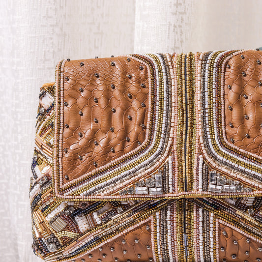 Theiya Tan clutch