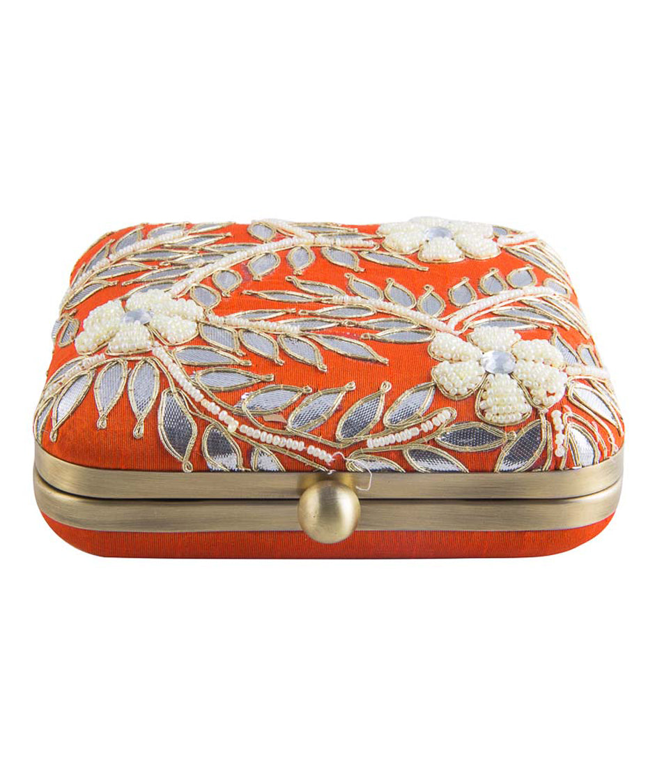 Orange gotapatti clutch