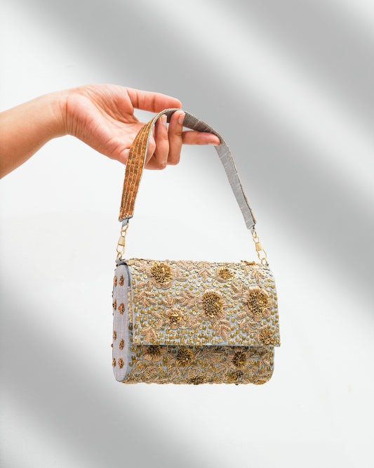Golden silver flower clutch