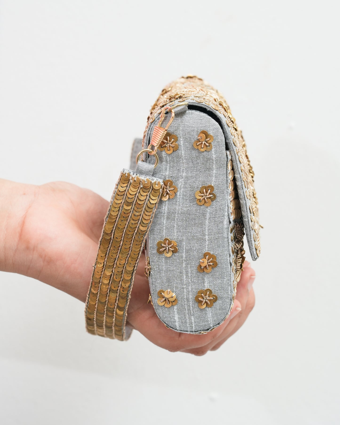 Golden silver flower clutch