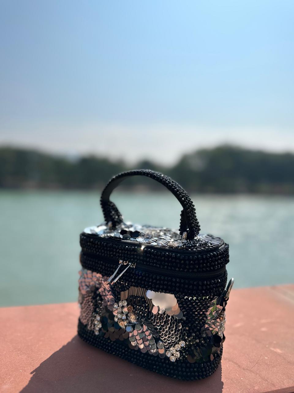 Sheeny gloss vanity bag