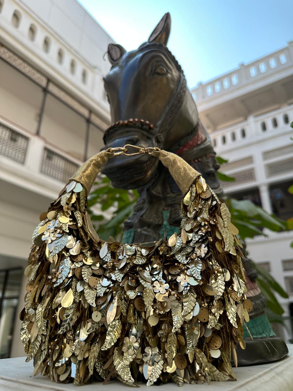 Royale gold moon bag