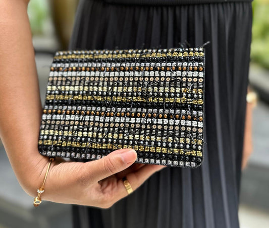 Midnight muse clutch bag